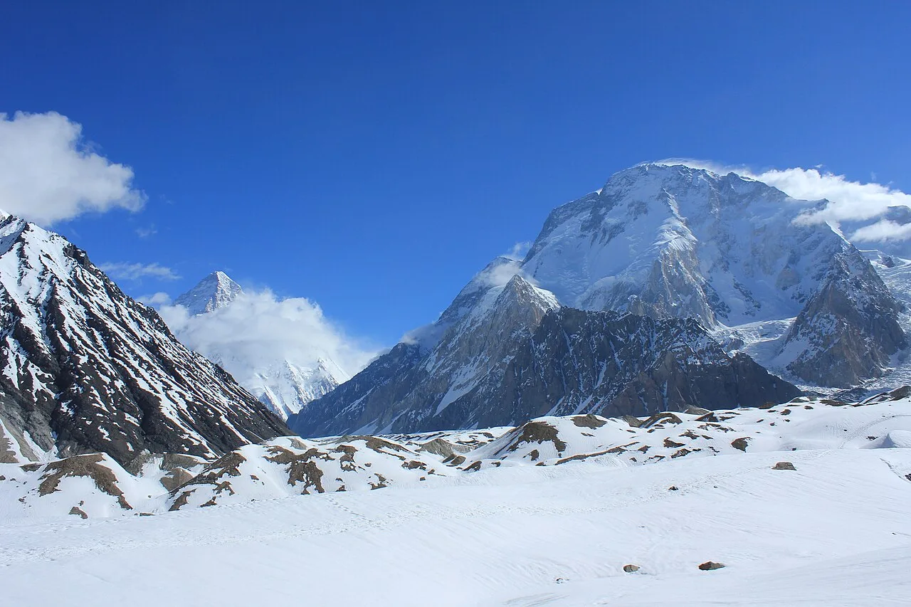 K2, climbed by the Abruzzi Spur, and Broad Peak above the Baltoro Glacier