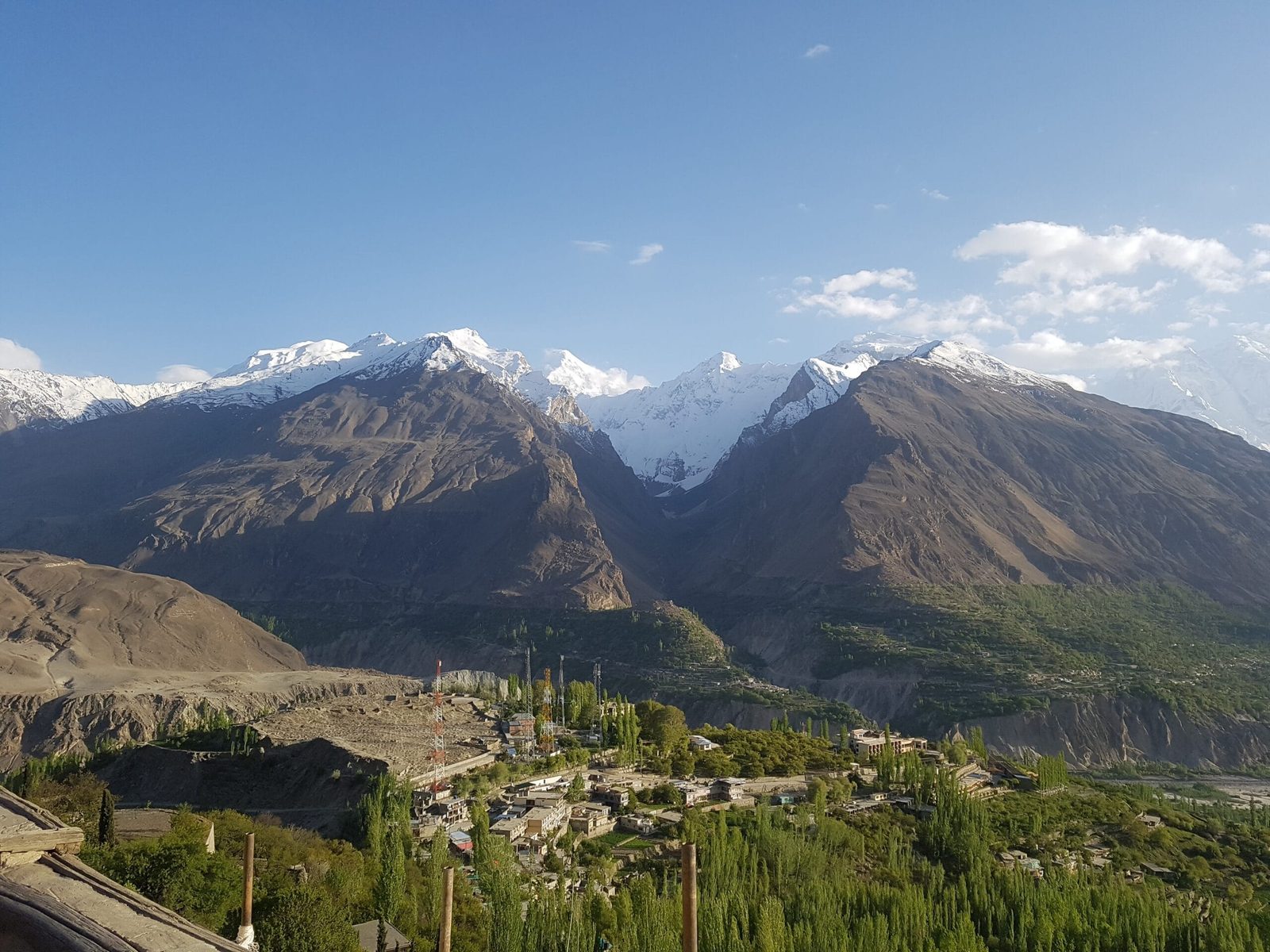 Baltit Fort above Karimabad with the Hunza Valley spread below, on the Ultar Meadow trek above Karimabad