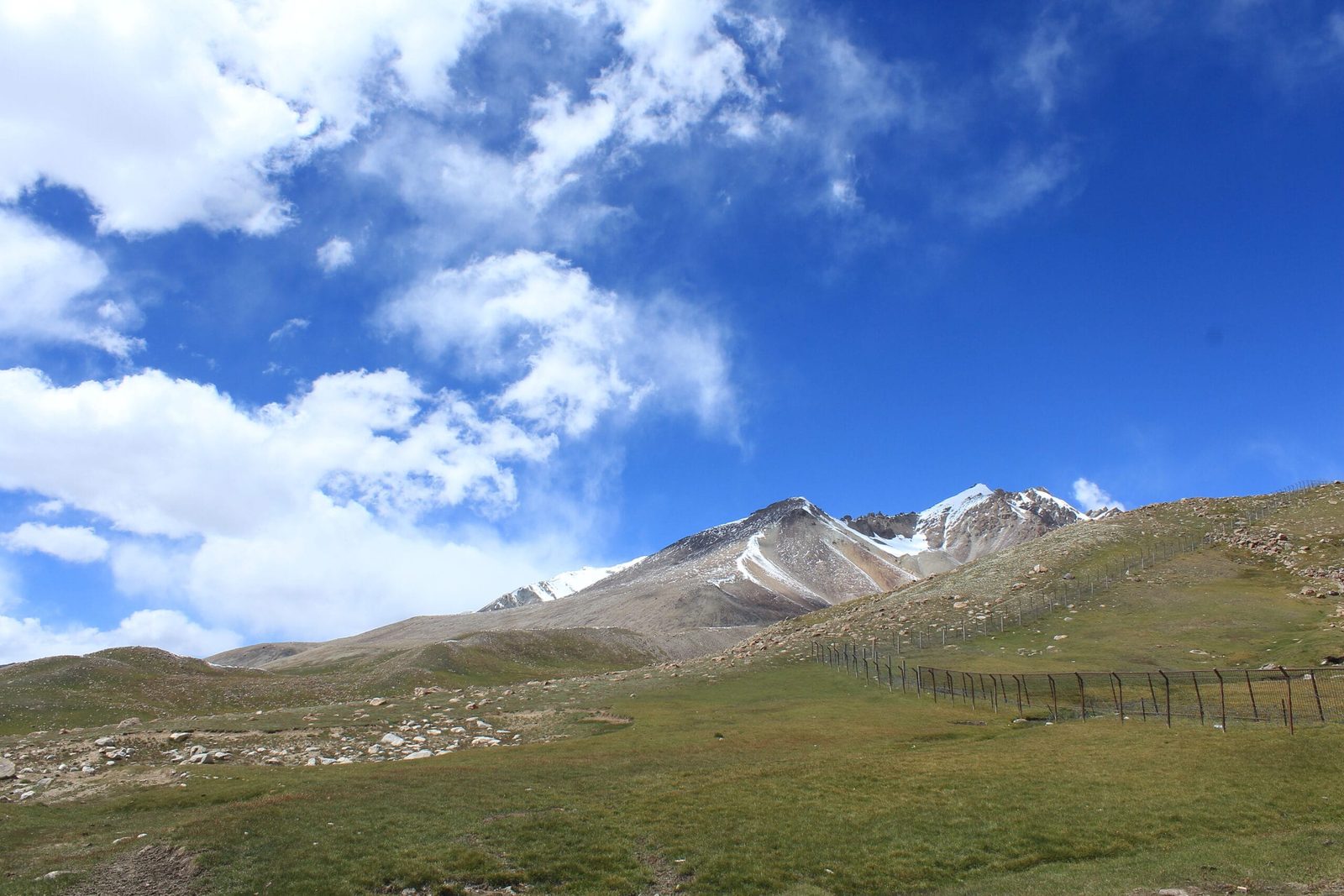 The Pakistan-China border fence and marker at Khunjerab Pass, 4,693 metres above sea level