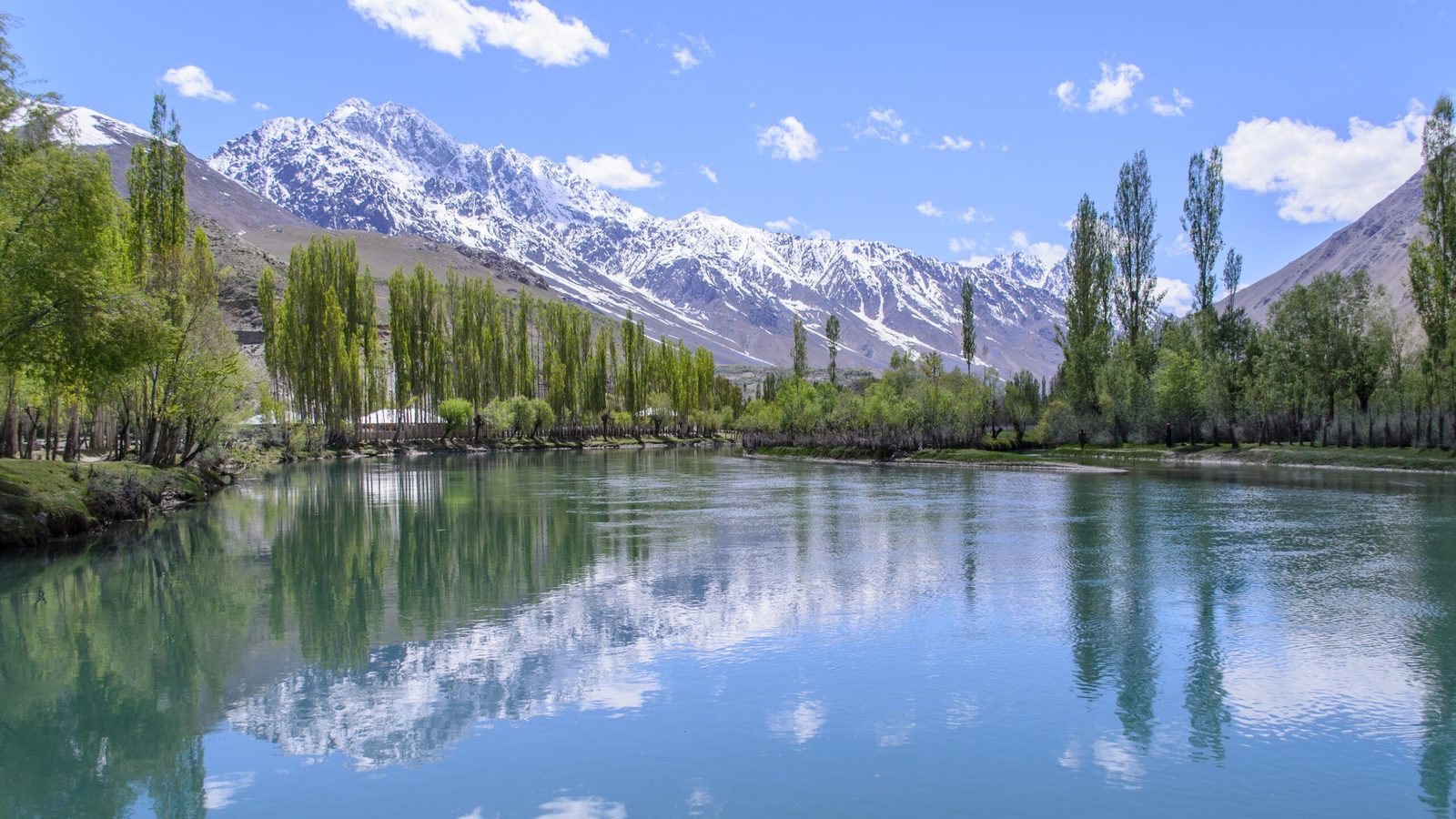The turquoise waters of Phander Lake surrounded by the Phander Valley in Gilgit-Baltistan