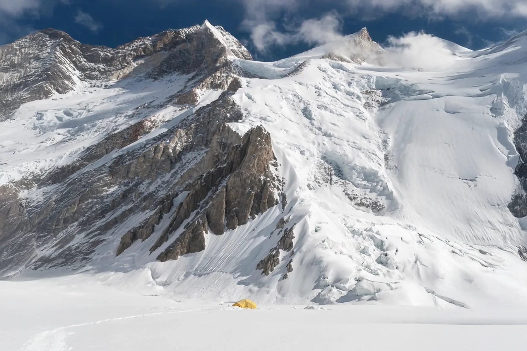 Hanging seracs on a Karakoram ice face above a glacier camp