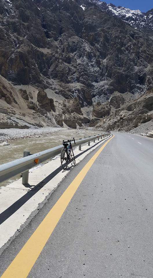 A bicycle on the Karakoram Highway climbing toward the Khunjerab Pass