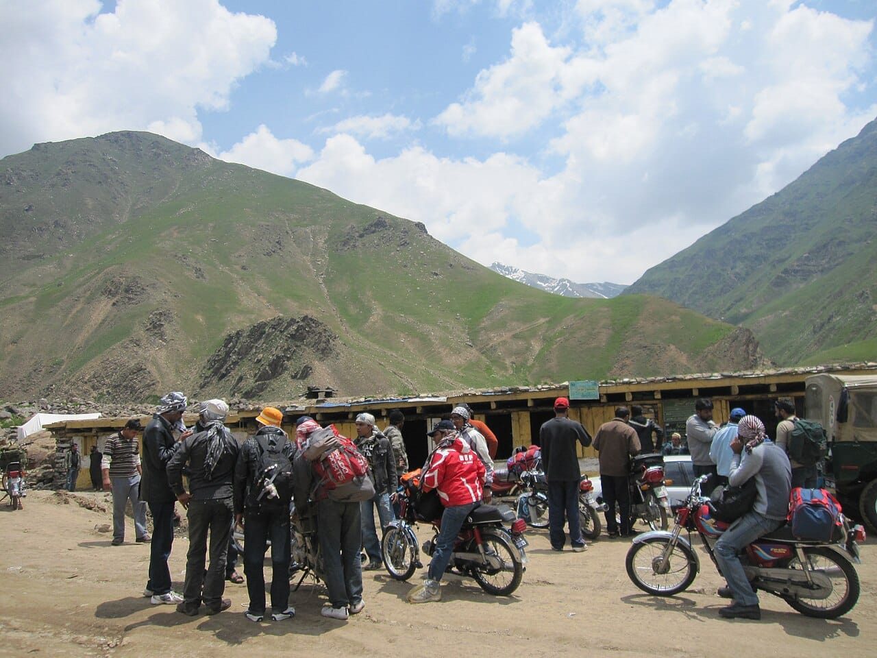 Motorcycle riders resting at Besal village in the Naran valley on the road to Babusar Pass